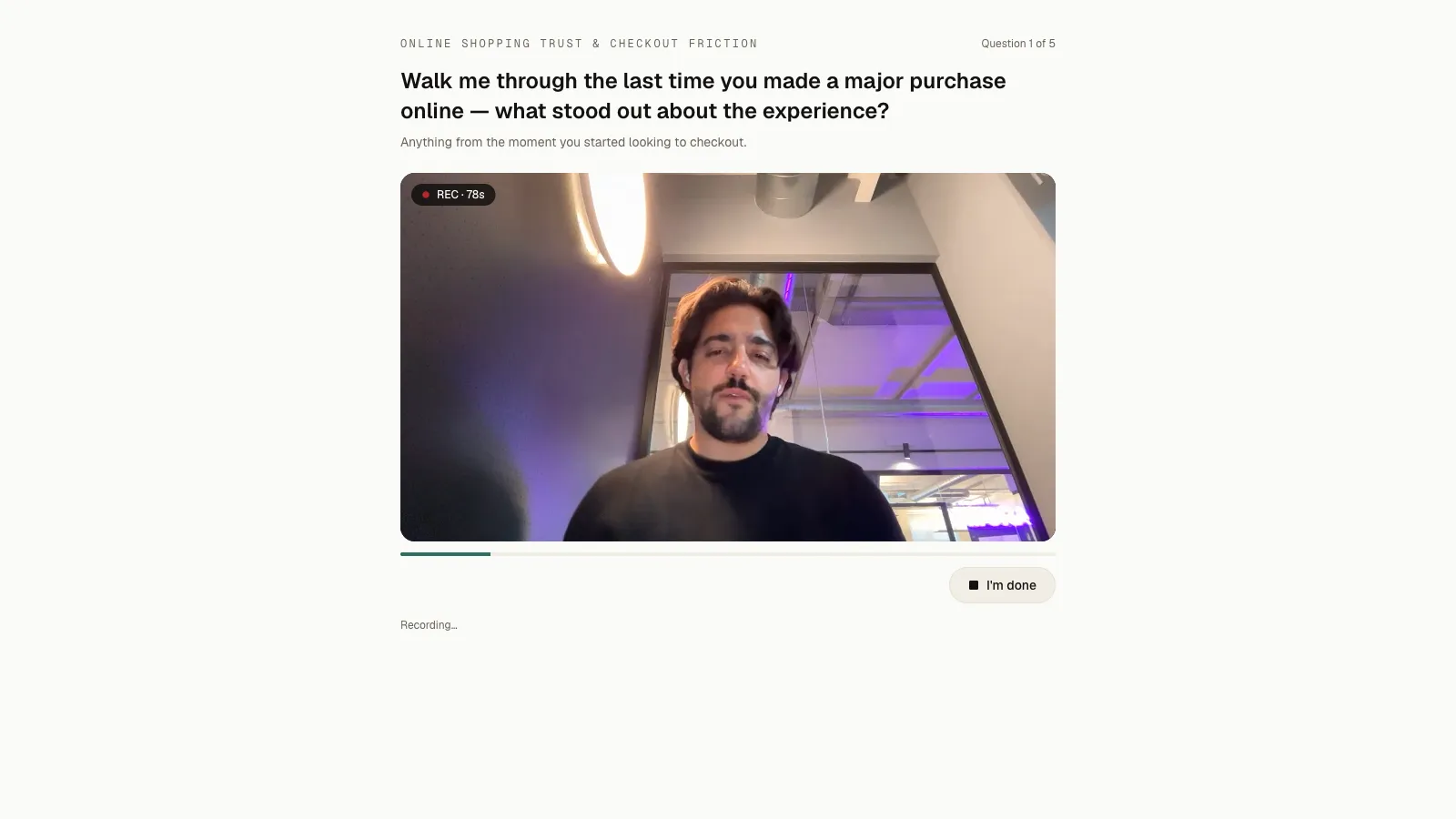 The respondent's recording view: a question, a webcam, and a record button, with no signals in sight
