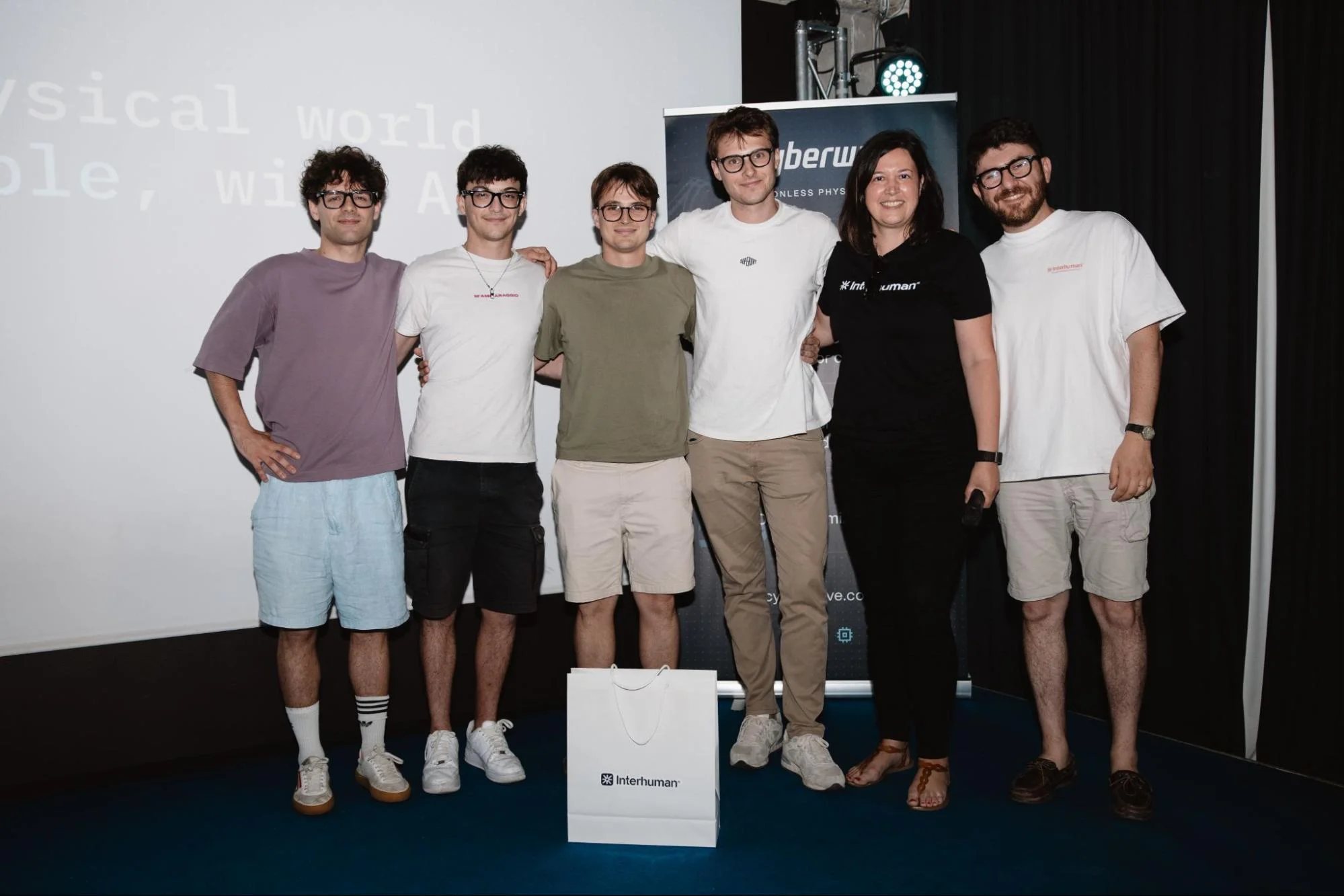 The WaveArm team receiving their prize at the Robotic Agents Hackathon in Milan